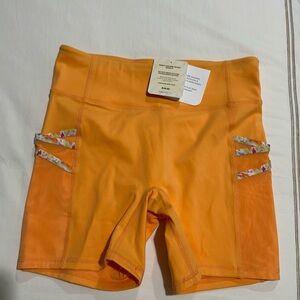 NWT Motion 365 Trinity mid-rise pocket short 5”